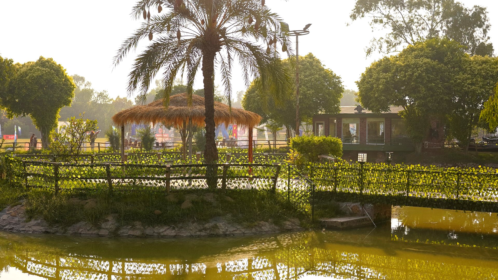 High-end lakeside corporate executive retreat and confidential board conclave pavilion overlooking the water gardens at J5 Resort Lahore