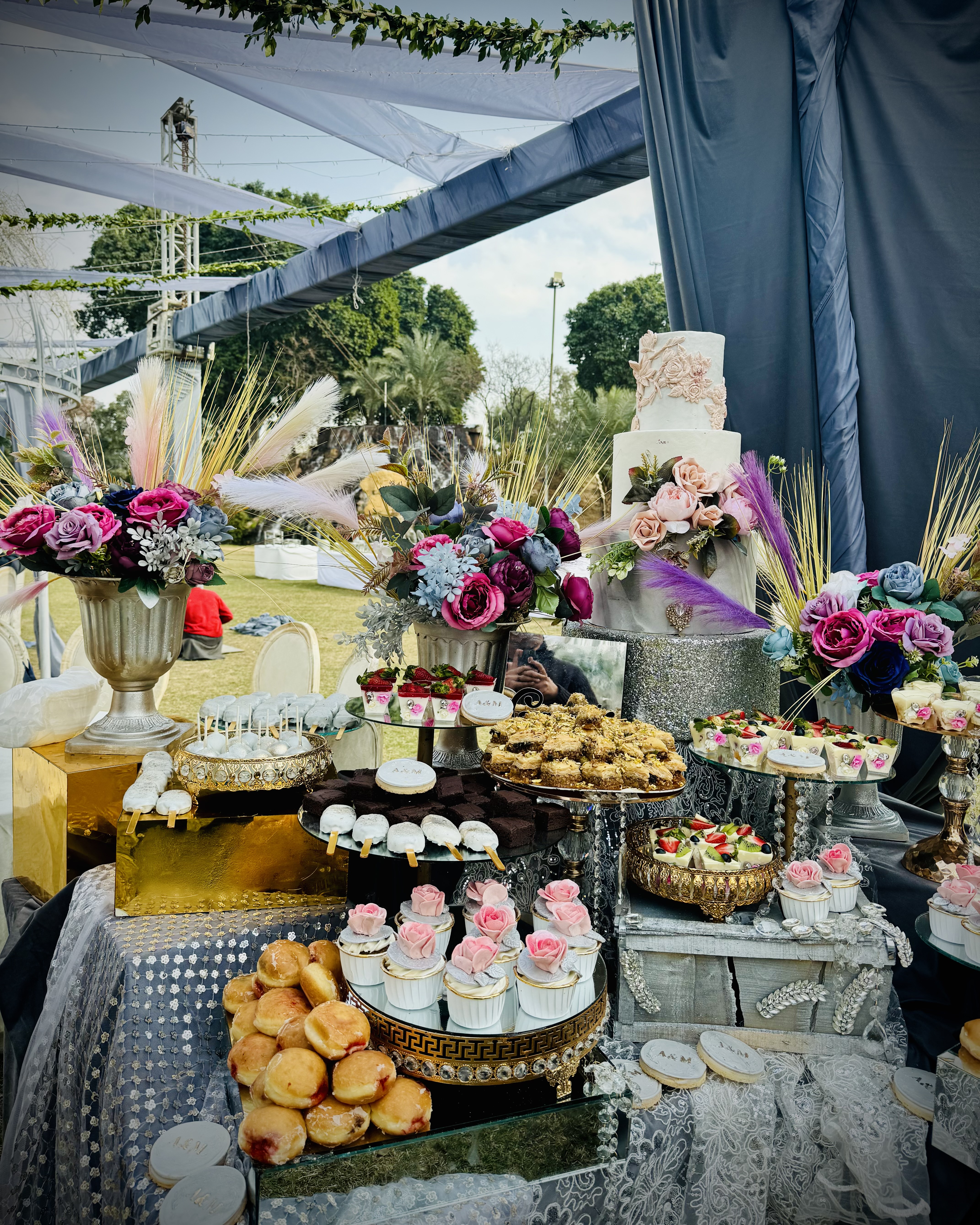 Stage Aesthetics for Walima: Pastel Florals, Soft Chandeliers & Modern Curves